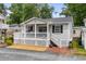Quaint beach cottage with a spacious front porch, perfect for relaxing at 6001-1808 S Kings Hwy., Myrtle Beach, SC 29575