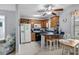 Bright kitchen featuring white appliances and a cozy breakfast bar at 6001-1808 S Kings Hwy., Myrtle Beach, SC 29575