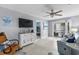 Bright living room featuring beachy decor and a view into the bedroom at 6001-1808 S Kings Hwy., Myrtle Beach, SC 29575