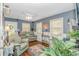 Cozy living area with plush seating, ample natural light, and elegant furnishings at 6001-N2 S Kings Hwy., Myrtle Beach, SC 29575