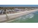 A beautiful aerial view shows a sandy beach next to attractive beachside homes at 6001-T3 S Kings Hwy., Myrtle Beach, SC 29575