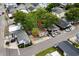 An aerial view of the home, landscaping, street, and neighborhood layout is shown at 6001-T3 S Kings Hwy., Myrtle Beach, SC 29575