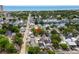 Stunning aerial view of the neighborhood showcases proximity to the beach, with mature trees at 6001-T3 S Kings Hwy., Myrtle Beach, SC 29575