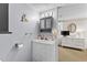 Cozy bathroom featuring a gray vanity with storage and decorative lighting fixtures at 6001-T3 S Kings Hwy., Myrtle Beach, SC 29575
