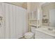 Well-maintained bathroom featuring a shower with white shower curtain and ample storage space at 6015 Catalina Dr. # 732, North Myrtle Beach, SC 29582