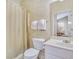 Well-lit bathroom with a neutral color palette and a shower with curtain at 6015 Catalina Dr. # 732, North Myrtle Beach, SC 29582