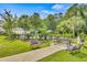 Community picnic area with seating, a grill and lush landscaping at 6015 Catalina Dr. # 732, North Myrtle Beach, SC 29582