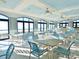 Community dining area with tables, chairs, ceiling fans, and ocean views at 6015 Catalina Dr. # 732, North Myrtle Beach, SC 29582