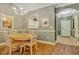 Cozy dining area with a round table and access to the kitchen and front door at 6015 Catalina Dr. # 732, North Myrtle Beach, SC 29582