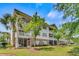 Beautiful building exterior featuring multiple screened porches at 6015 Catalina Dr. # 732, North Myrtle Beach, SC 29582