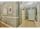 Inviting hallway with tile floors and a view of the kitchen and front door at 6015 Catalina Dr. # 732, North Myrtle Beach, SC 29582