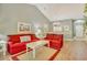 Inviting living room with vaulted ceiling, showcasing stylish furniture and open floor plan to dining area at 6015 Catalina Dr. # 732, North Myrtle Beach, SC 29582