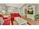 Open-concept living area showcases a dining table, entertainment center and lots of natural light at 6015 Catalina Dr. # 732, North Myrtle Beach, SC 29582