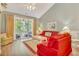 Bright living room with a sliding door to the balcony, featuring stylish decor and comfortable seating at 6015 Catalina Dr. # 732, North Myrtle Beach, SC 29582