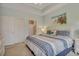 Comfortable main bedroom with a large window, easy access to a full bathroom, and stylish decor at 6015 Catalina Dr. # 732, North Myrtle Beach, SC 29582
