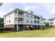 Three-story apartment homes with private balconies and lawn at 604 Heathrow Dr. # 1097, Myrtle Beach, SC 29579