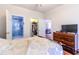 Comfortable main bedroom leading to closet and bathroom, with hardwood floors and ample natural light at 604 Heathrow Dr. # 1097, Myrtle Beach, SC 29579