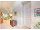 Bright foyer with white wood flooring, antique trunk, and an open view into the living room at 631 Rycola Circle, Surfside Beach, SC 29575