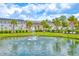 Community pond featuring a fountain and lush landscaping, enhancing the neighborhood's appeal at 631 Rycola Circle, Surfside Beach, SC 29575