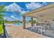 Community pool area has lounge chairs and tables providing a relaxing outdoor space for residents at 631 Rycola Circle, Surfside Beach, SC 29575