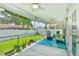 Spacious screened-in porch with outdoor seating and a view of the well-maintained backyard at 631 Rycola Circle, Surfside Beach, SC 29575