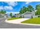 Street view of a home, featuring a well-kept lawn and a concrete driveway at 631 Rycola Circle, Surfside Beach, SC 29575