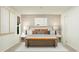 Bright main bedroom featuring neutral decor, modern furniture, and lots of natural light at 6344 Swainson Street Sw, Ocean Isle Beach, NC 28469