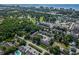 An aerial view captures the layout of the neighborhood, featuring mature trees and landscaping at 6702 Jefferson Pl. # C6, Myrtle Beach, SC 29572