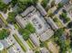 Overhead shot of complex with ample parking, mature trees, and well-maintained landscaping at 6702 Jefferson Pl. # C6, Myrtle Beach, SC 29572