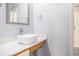 Bathroom sink with modern finishes, neutral walls, and a decorative mirror at 6702 Jefferson Pl. # C6, Myrtle Beach, SC 29572