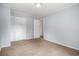 Cozy bedroom features neutral carpeting and a built-in closet with ample storage space at 6702 Jefferson Pl. # C6, Myrtle Beach, SC 29572