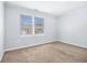 Bedroom with one window, neutral walls, and plush carpeting at 6702 Jefferson Pl. # C6, Myrtle Beach, SC 29572