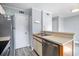 Kitchen featuring stainless steel appliances, modern countertops, white cabinets, and a stainless steel dishwasher and refrigerator at 6702 Jefferson Pl. # C6, Myrtle Beach, SC 29572