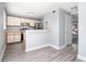 The kitchen offers ample counter space, white cabinets, modern appliances, and an open design for easy access to the dining area at 6702 Jefferson Pl. # C6, Myrtle Beach, SC 29572