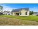 The back exterior features a patio, lawn, and open space at 800 Stone Pine Ct., Loris, SC 29569