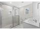 Well-lit bathroom featuring a glass shower, vanity, and modern fixtures at 800 Stone Pine Ct., Loris, SC 29569