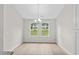 Bright dining area featuring hardwood floors, modern light fixture and bright view at 800 Stone Pine Ct., Loris, SC 29569