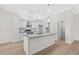 Modern kitchen with granite countertops, stainless steel appliances, and a central island at 800 Stone Pine Ct., Loris, SC 29569