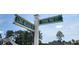 A street sign shows the way to Long Meadow Dr. and Stone Pine Ct. under a partly cloudy sky at 800 Stone Pine Ct., Loris, SC 29569