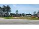 View of a residential lot under construction with foundation in a wooded area at 800 Stone Pine Ct., Loris, SC 29569