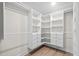 Walk-in closet with custom shelving and drawers at 800 Stone Pine Ct., Loris, SC 29569