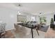 Inviting dining room area with stylish furnishings and abundant natural light at 820 Fairway Dr. # 1502Hh, Longs, SC 29568