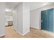 Hallway leading into unit with hard surface flooring, leading into kitchen at 820 Fairway Dr. # 1502Hh, Longs, SC 29568
