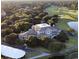 Aerial view of a clubhouse with golf course featuring gorgeous landscaping at 95 Sanderling Ave., Georgetown, SC 29440