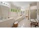 Bright bathroom with a soaking tub, double vanity, and separate shower at 95 Sanderling Ave., Georgetown, SC 29440