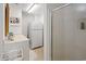Functional bathroom with a walk-in shower, sink, and refrigerator at 95 Sanderling Ave., Georgetown, SC 29440