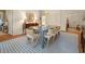Elegant dining room with an elongated dining table, tasteful decor, and matching furniture at 95 Sanderling Ave., Georgetown, SC 29440