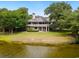 Beautiful home with a serene waterfront view, offering a peaceful and picturesque living experience at 95 Sanderling Ave., Georgetown, SC 29440