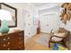 Bright foyer with a hat display, decor, and a glimpse of a door to another area at 95 Sanderling Ave., Georgetown, SC 29440