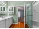 Bathroom featuring a vanity with ample storage and a walk in shower, blending style and functionality at 100 Lazy Willow Ln. # 103, Myrtle Beach, SC 29588